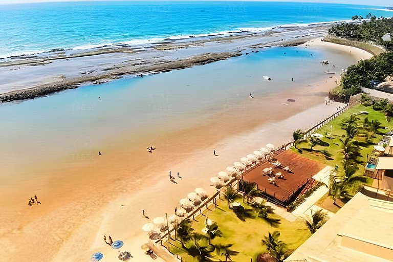 Foot in the Sand, Pools and Sea with Natural Pools