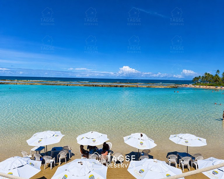 Foot in the Sand, Pools and Sea with Natural Pools